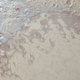 Illustration for article titled New, Insanely High-Resolution Pluto Images Include More Color—and Weird "Snakeskin" Textures